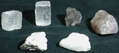 Back row, left to right: Calcite; Halite; Fluorite; Quartz; Front row, left to right: Talc; Gypsum